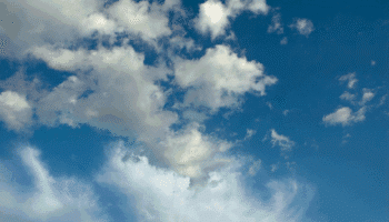 A title image of bright blue skies, filled with assorted clouds.